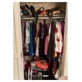 One of many closests full of lightly worn stylish clothes
