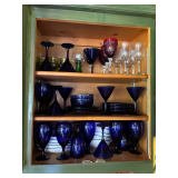 Blue glass dinner plates, bowls, glassware