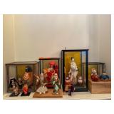 Japanese dolls and traditional figurines displayed in cases at a Bellevue Estate Sale.