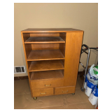 Rolling cabinet with shelving and drawers