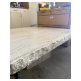 Rectangular travertine-style stone coffee table
