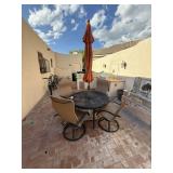Outdoor mental table with 4 chairs and umbrella