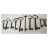 1021	GROUP OF LARGE ANTIQUE DOOR KEYS, TALLEST APPROXIMATELY 8 IN