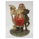 1042	CAST IRON SANTA & REINDEER DOOR STOP, APPROXIMATELY 8 IN HIGH