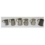 1079	PEWTER TANKARDS AND MEASURES, TALLEST APPROXIMATELY 7 IN H