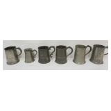 1093	PEWTER TANKARDS AND MEASURES, TALLEST APPROXIMATELY 6 1/2 IN H