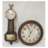 1152	ANSONIA 23 IN ROUND 30 DAY WALL CLOCK AND WATERBURY BANJO CLOCK APPROXIMATELY 36 IN H