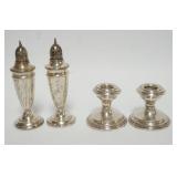 1008	STERLING WEIGHTED CANDLESTICKS & SALT & PEPPER, TALLEST APPROXIMATELY 6 IN HIGH																