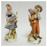 1035	PAIR OF PORCELAIN FIGURINES OF MAN & WOMAN																																																					