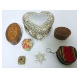 1048	ASSORTED BOXES INCLUDING MUSICAL JEWELRY, LEATHER, PILL, AND BOX WITH GLASS KISS															