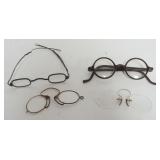 1127	GROUP OF ANTIQUE EYE GLASSES																																																																			