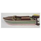 1167	WOOD TOY MODEL BOAT W/BATTERY POWERED OUTBOARD MOTOR, APPROXIMATELY 12 IN X 4 IN X 2 1/2 IN HIG