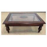 1194	LANE GLASS TOP COCKTAIL TABLE W/WOVEN CANE UNDER GLASS, APPROXIMATELY 49 IN X 36 IN X 19 IN HIG