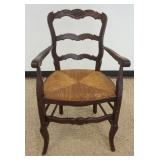 1196	FRENCH COUNTRY RUSH SEAT ARMCHAIR W/BASKET CARVED CREST, APPROXIMATELY 23 IN X 20 IN X 3 IN HIG