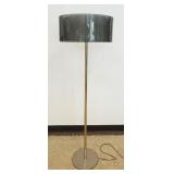 1215	MID CENTURY MODERN FLOOR LAMP W/SMOKED LUCITE CIRCULAR SHADE, APPROXIMATELY 17 IN X 55 IN HIGH	