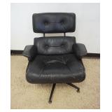 1216	VINTAGE EAMES STYLE ARMCHAIR, WEAR TO VINYL, APPROXIMATELY 33 IN X 30 IN X 36 IN HIGH										