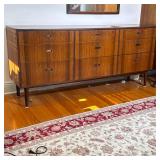 MAURICE VILLENCY MID-CENTURY MODERN ROSEWOOD NINE-DRAWER DRESSER