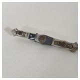 TIBETAN SILVERED METAL AND CARNELIAN INSET DAGGER WITH SCABBARD