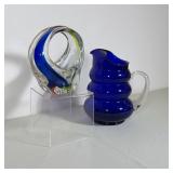 (2pc) COBALT BLUE GLASS BEEHIVE PITCHER AND MULTI-COLOR ART GLASS BASKET