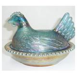blue glass hen on nest
