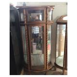Tall oak curio cabinet 