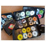 Over 500 Assorted Music CDs Stored in Binder Organizers
