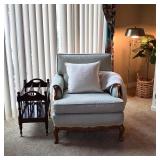 Vintage upholstered armchair, wood magazine rack and traditional lighting at our Fullerton estate sa