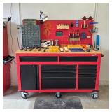 Milwaukee rolling workbench and tool storage cabinet with wood worktop.