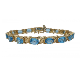 7" 14K Yellow Gold Oval Blue Topaz Link Bracelet