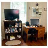 Oak desk, books, shelves