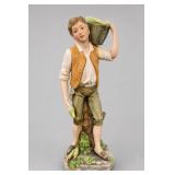 Painted Figural Boy Figurine Carrying A Leaf Base