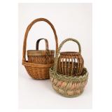 Three Wicker Baskets With Handles Three Wicker Baskets With Handles