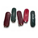 Four Swiss Army-Style Pocket Knives