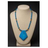 Blue Beaded Pendant Necklace With Brass Accents
