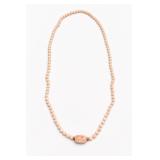 Angel Skin Coral Bead Necklace With Carved Center