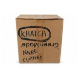 Mixed Clothes In Cardboard Box