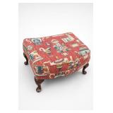 Upholstered Ottoman With Carved Feet