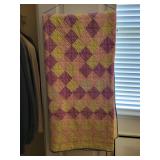 Hand-stitched quilt