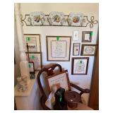 Assortment of framed needlepoint throughout home