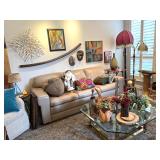 Living Area filled with beautiful items, leather beige sofa