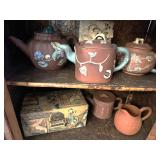 Assortment of Asian teapots vintage Chinese clay teapots by Yixing Zisha