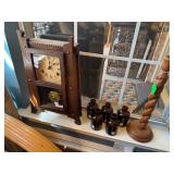 Antique table clock, Brown medicine bottles, carved candle stick