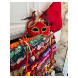 Colorful rug, mask and pillow
