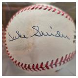 Multi-Autographed baseball by HOFamers Mickey Mantle, Duke Snider & Willie Mays.