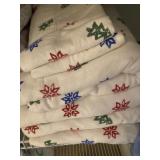 many sheet sets, comforters, spreads