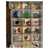 Box lot of brooches