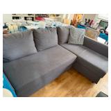 SECTIONAL COUCH WITH STORAG AND OPENS TO BED