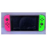 Nintendo Switch Handheld Console, Extra Set Of 2 Joy-Cons, Joy-Con Grip, RCA Cables, And More