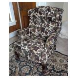 Upholstered Recliner Chair With Cigar And Book Motif And Claw Feet