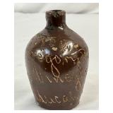 Brown Glazed Miniature Stoneware Jug with Incised Script, 3 1/2 in.